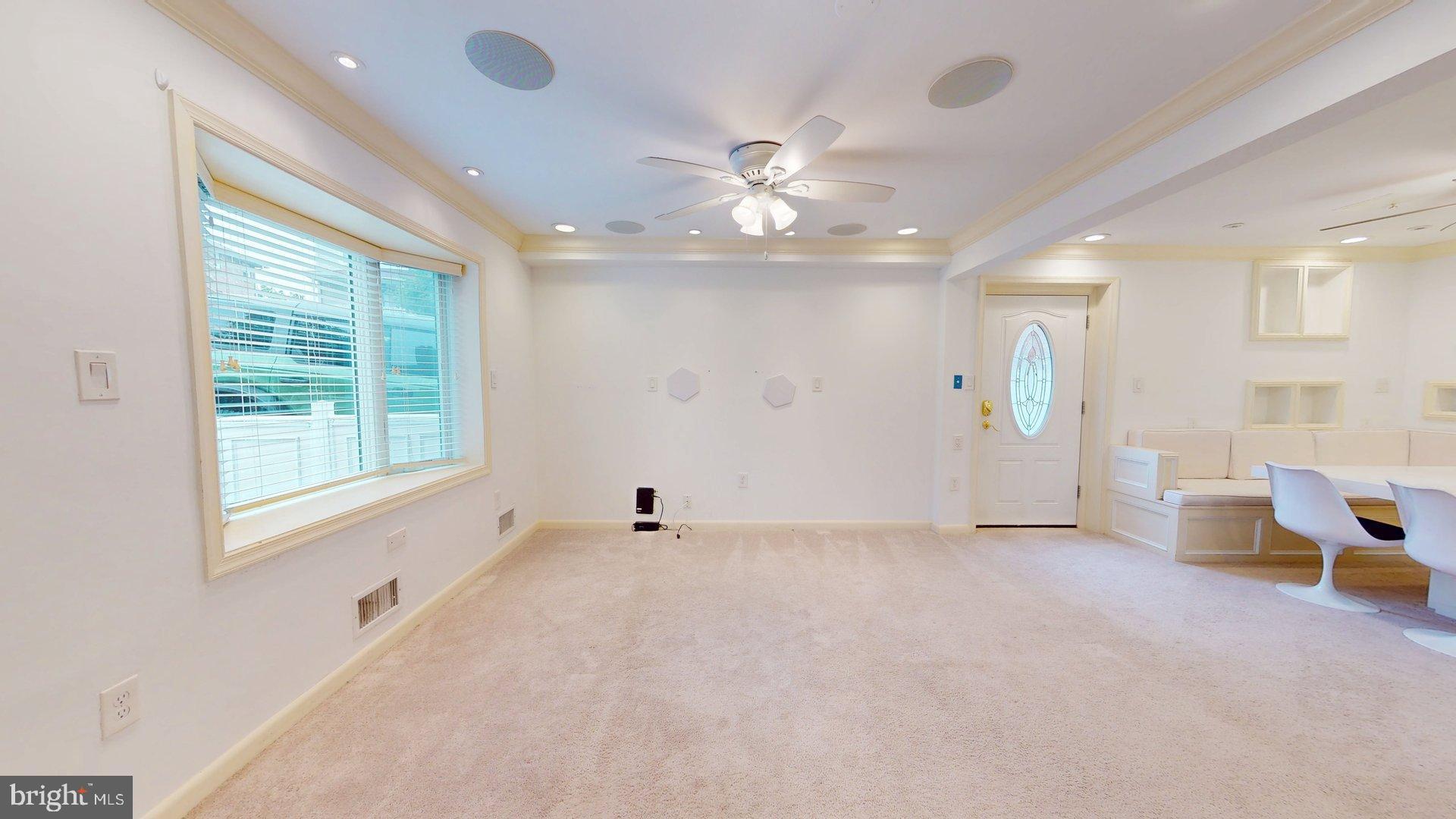 4145 21st Road North, Unit B Arlington, VA 22207 - Photo 4 of 29 a view of an empty room with a window