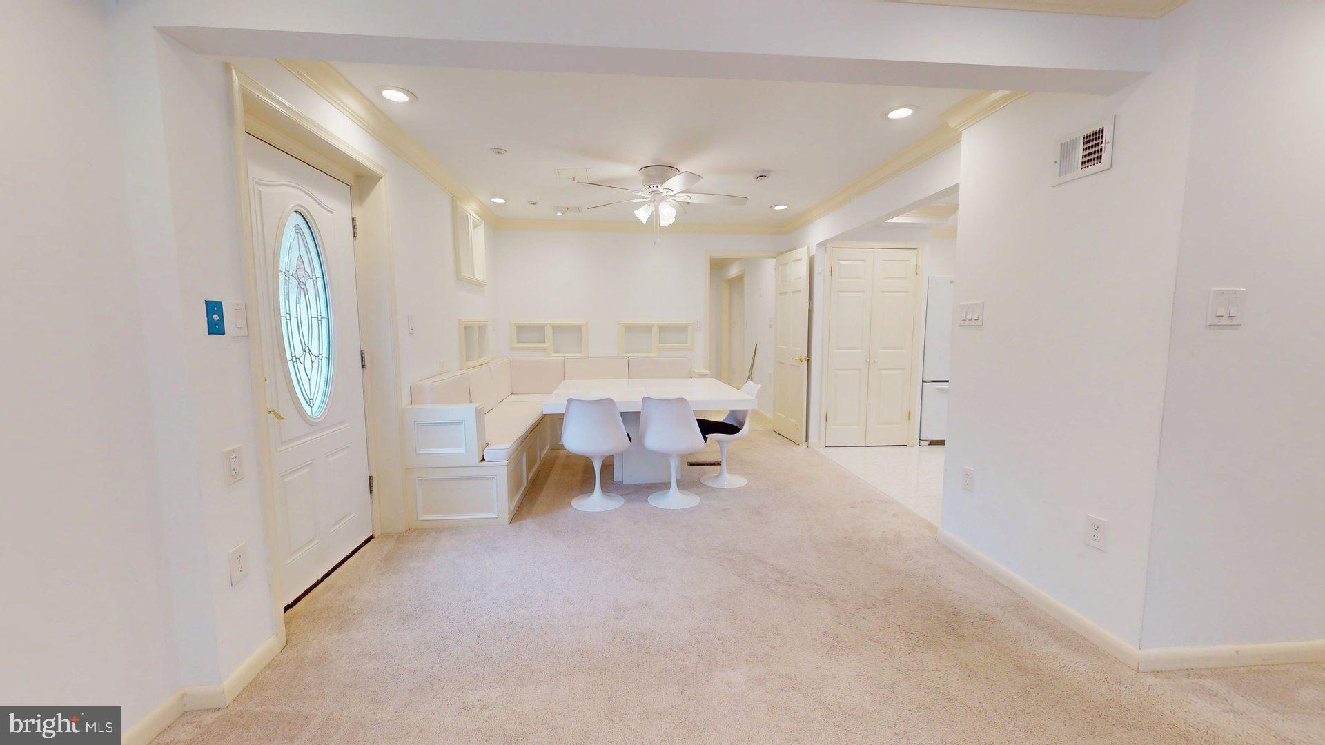 4145 21st Road North, Unit B Arlington, VA 22207 - Photo 6 of 29 a view of living room with furniture and a chandelier