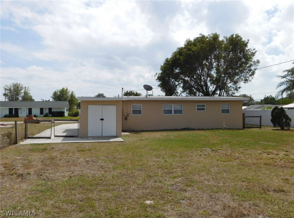 7277 Myrtle Road Fort Myers, FL 33967 - Photo 14 of 17 a view of a large space with a big yard