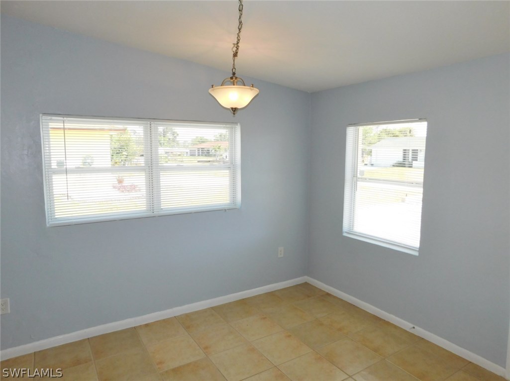 7277 Myrtle Road Fort Myers, FL 33967 - Photo 4 of 17 a view of an empty room with a window