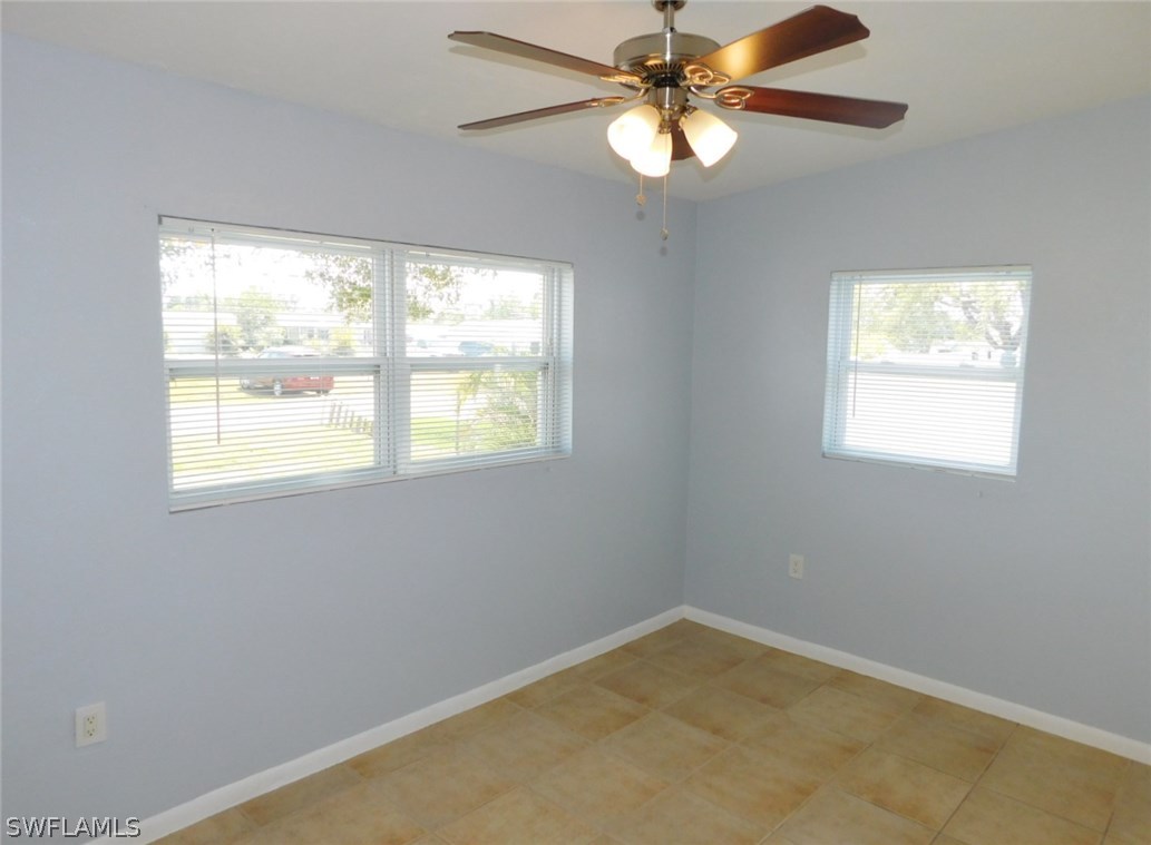 7277 Myrtle Road Fort Myers, FL 33967 - Photo 5 of 17 a view of an empty room with a window