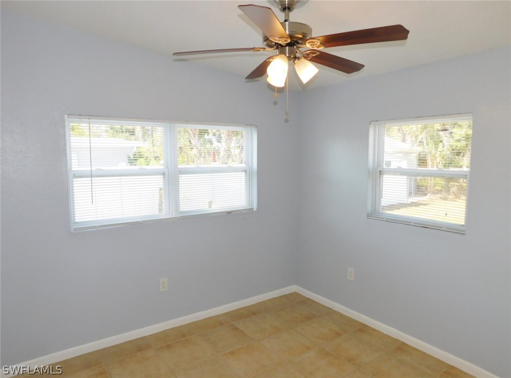 7277 Myrtle Road Fort Myers, FL 33967 - Photo 7 of 17 an empty room with a window