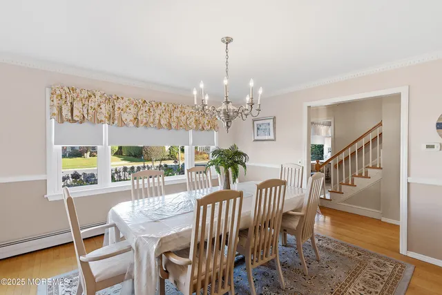 a kitchen with appliances cabinets a sink and a counter top space