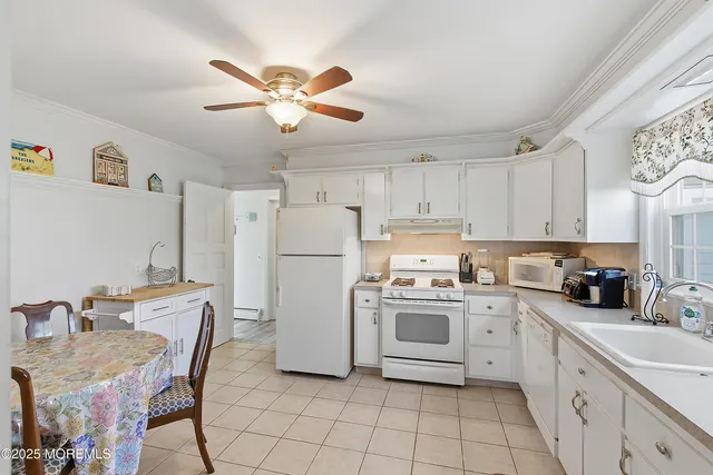 an aerial view of a city with ocean view