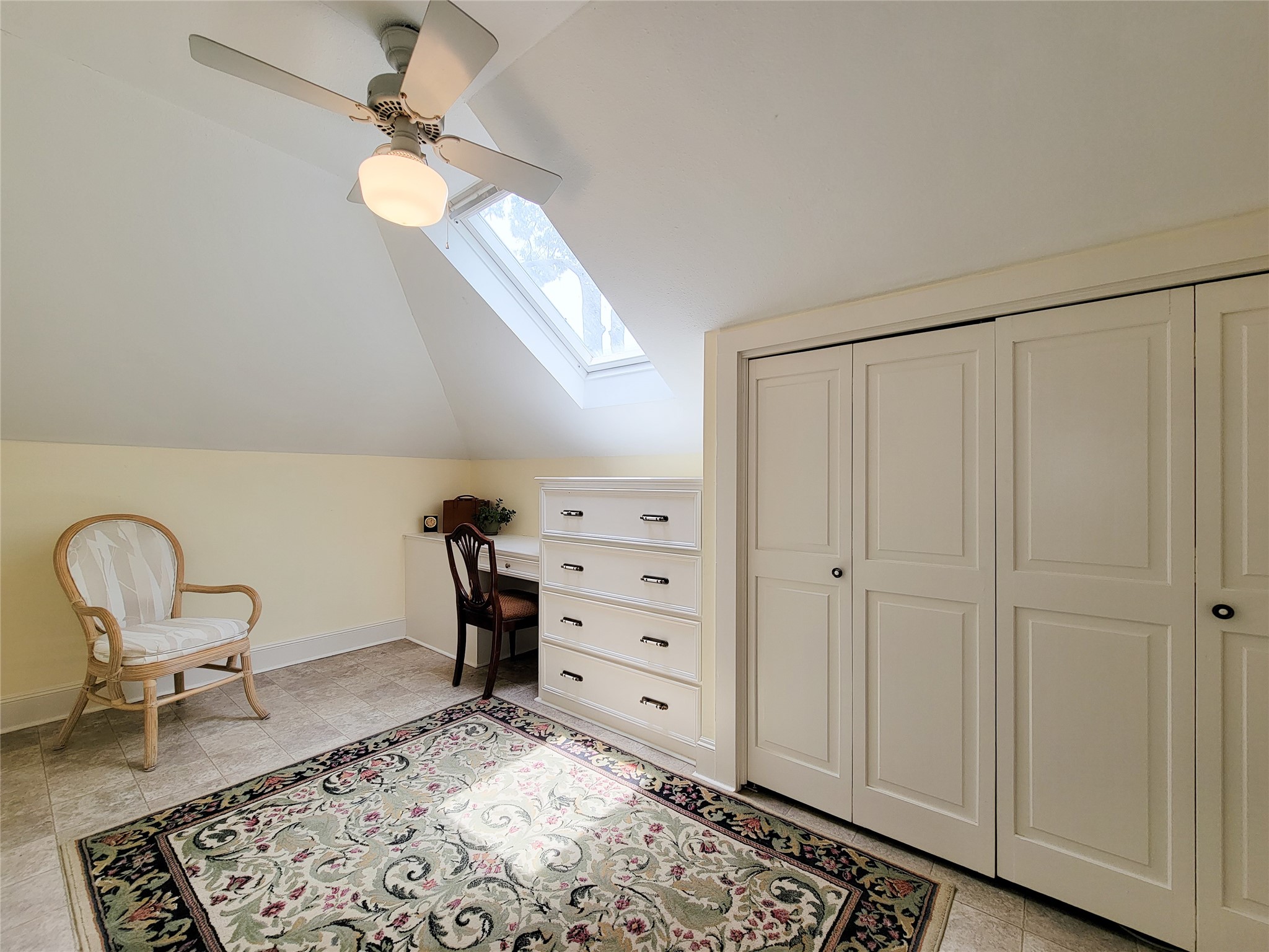 1406 Key Street Brenham, TX 77833 - Photo 28 of 50 Bright upstairs hobby room with a skylight, ample closet space, and potential to serve as a fourth bedroom.