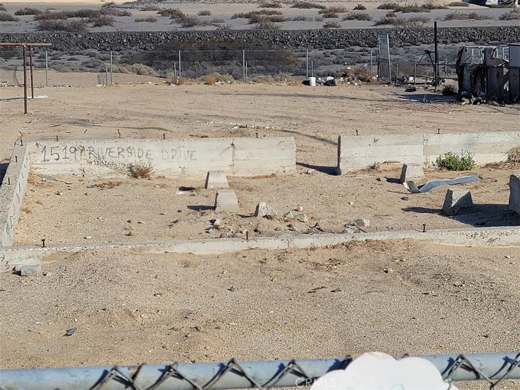 1519 Riverside Drive Barstow, CA 92311 - Photo 5 of 9 a view of yard with wooden floor