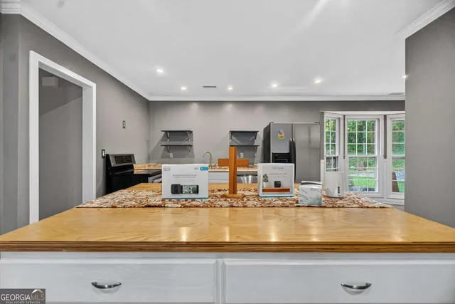 a bathroom with a toilet sink vanity and mirror