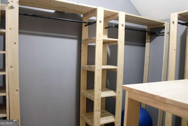 a view of a house with a yard porch and sitting area