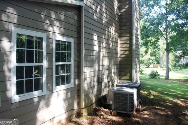 a backyard of a house with lots of green space