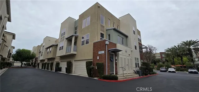 a view of a street with buildings