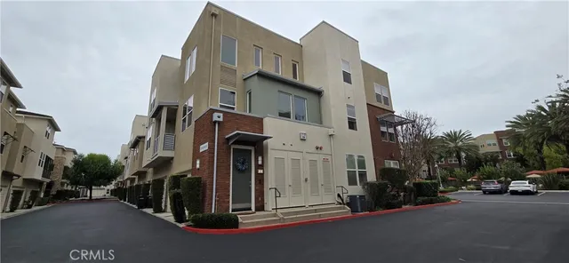 a view of a street with cars