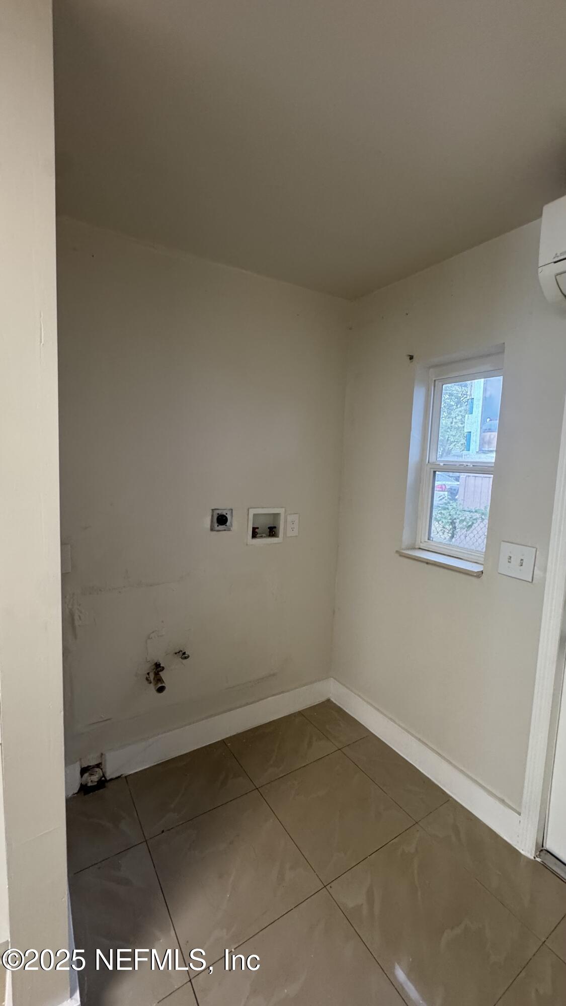 1052 Maynard Street, Unit 1044 Jacksonville, FL 32208 - Photo 5 of 7 a view of an empty room