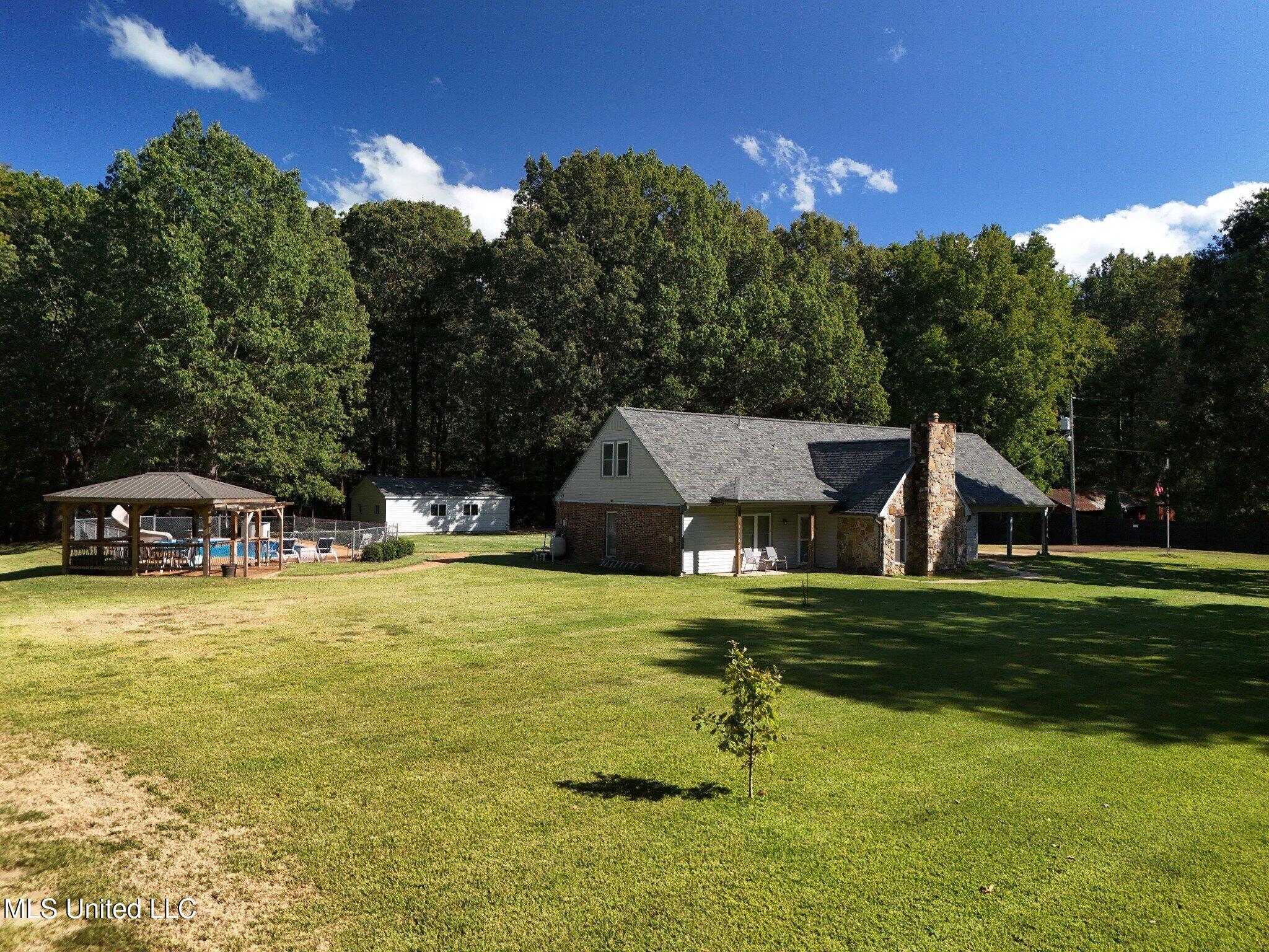 6650 Scenic Hollow Road Walls, MS 38680 - Photo 3 of 49 07_exterior_backyard_wide
