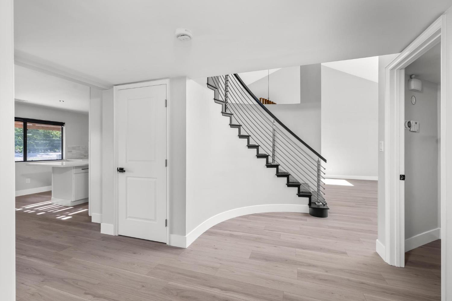 29879 South Chrisman Road Tracy, CA 95304 - Photo 18 of 50 a view of entryway with wooden floor