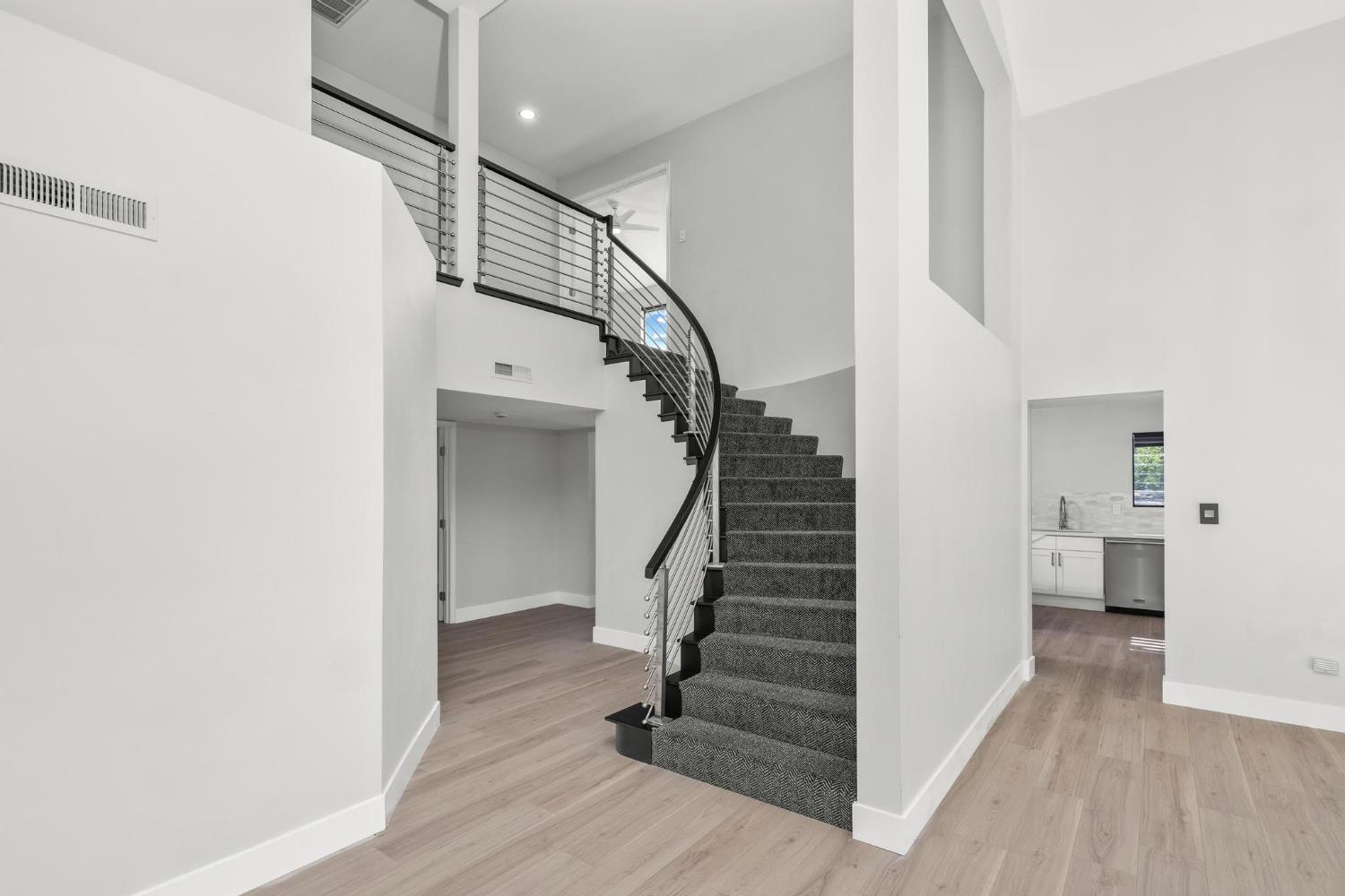 29879 South Chrisman Road Tracy, CA 95304 - Photo 25 of 50 a view of entryway and hall with wooden floor