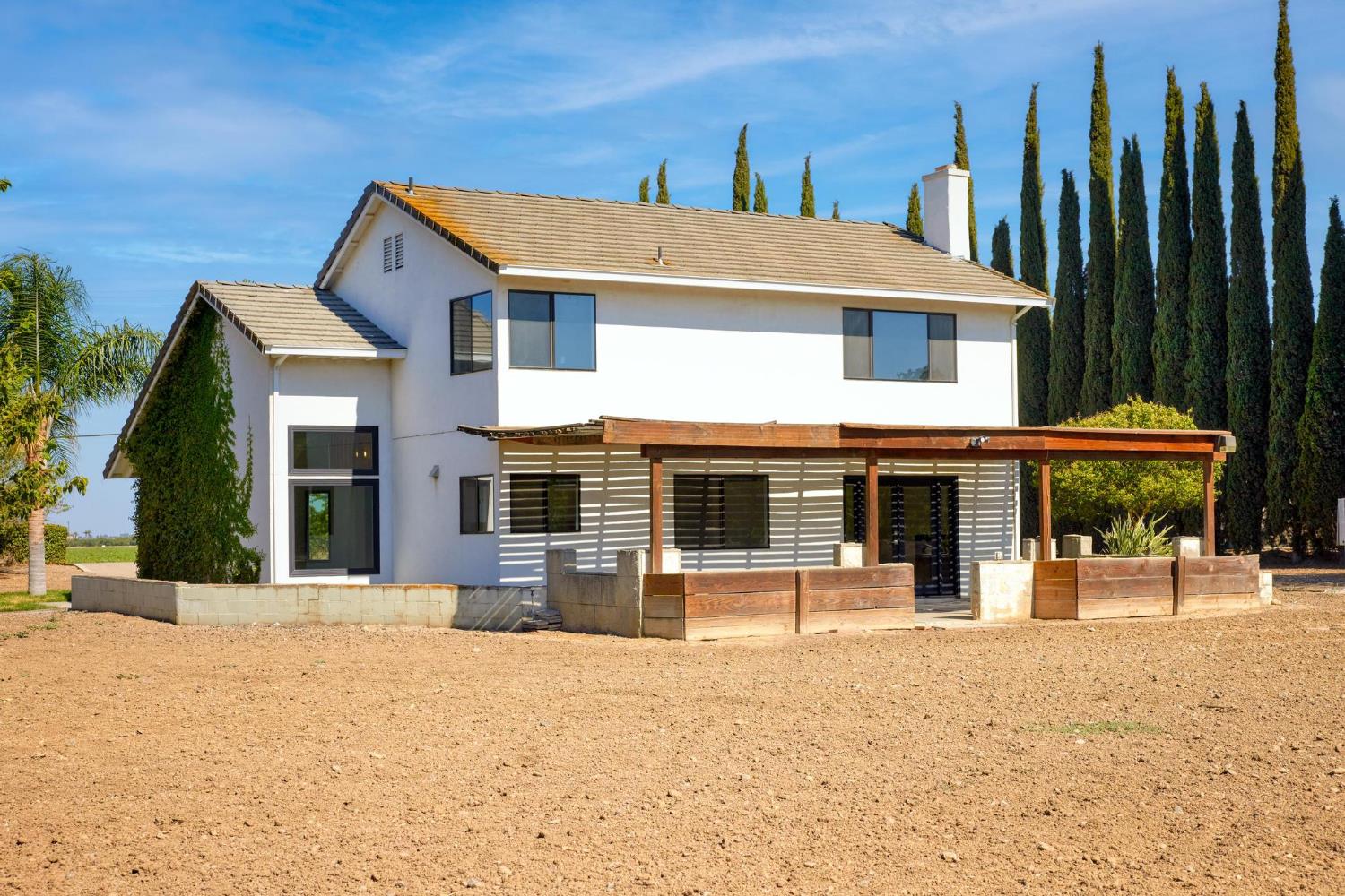 29879 South Chrisman Road Tracy, CA 95304 - Photo 42 of 50 a front view of a house with a yard