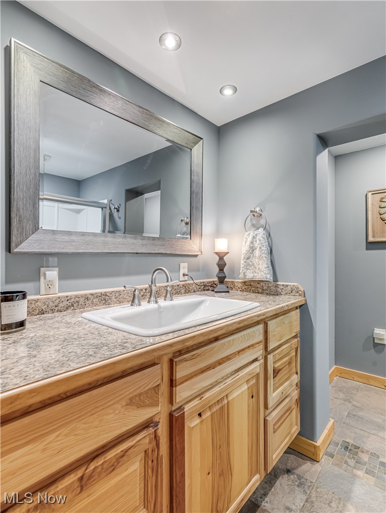 2161 Ganyard Road Akron, OH 44313 - Photo 35 of 43 Lower level full bath with heated slate floor
