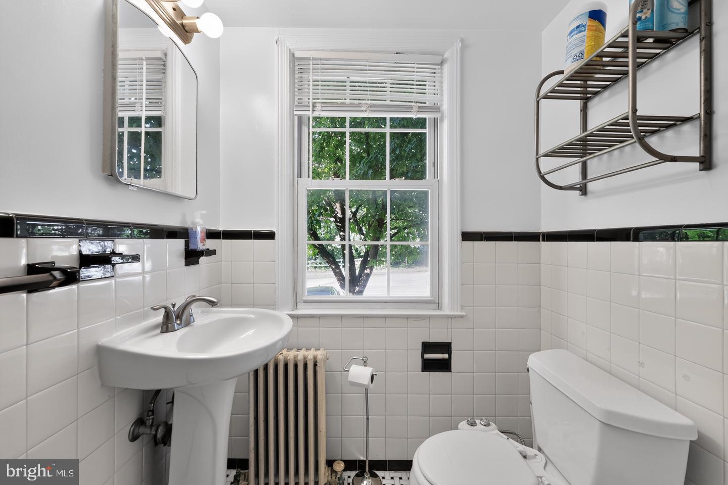 8329 Grubb Road, Unit G103 Silver Spring, MD 20910 - Photo 13 of 24 Bright and airy bathroom retreat.