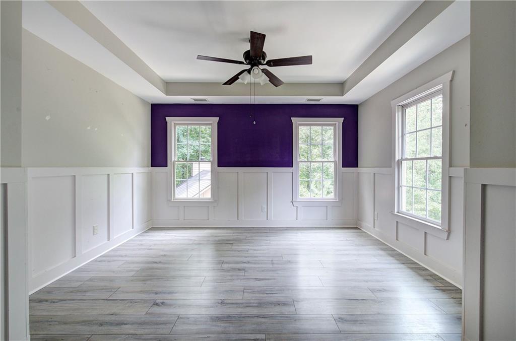 561 Holland Road Dallas, GA 30157 - Photo 10 of 48 wooden floor in an empty room with a window
