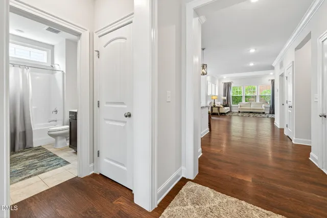 a view of a house with potted plants