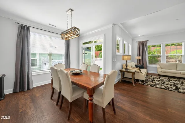 a kitchen with granite countertop a sink stainless steel appliances and cabinets