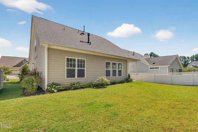 a patio with table and chairs