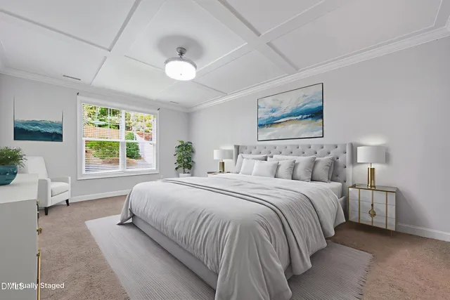 a living room with furniture and a rug
