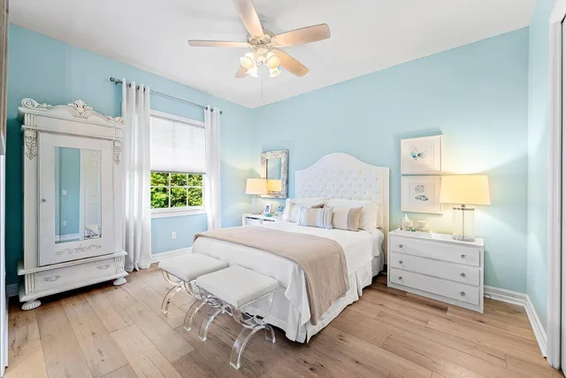 a bedroom with a bed and couch