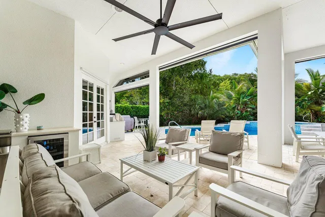 a view of a swimming pool with a patio
