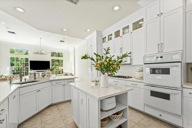 a kitchen with a sink and counter top space