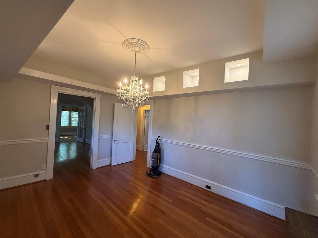1901 Avon Road Southwest, Unit LOWR Roanoke, VA 24015 - Photo 13 of 31 a view of empty room with wooden floor and fan