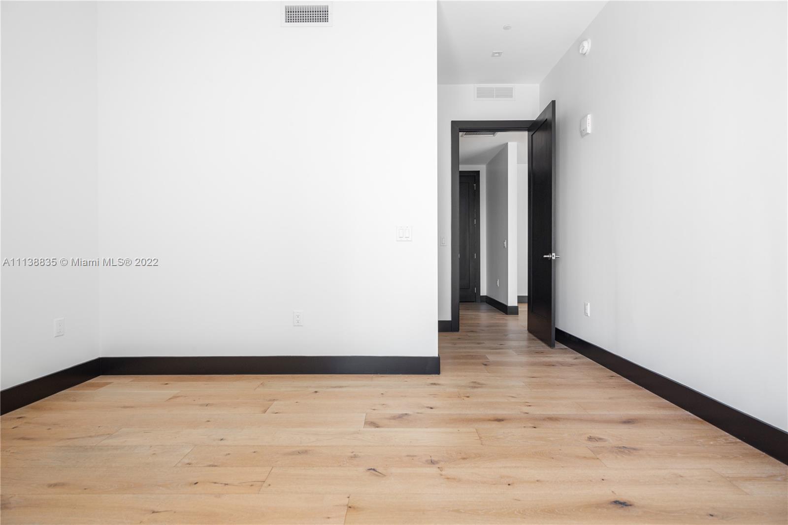 340 Southeast 3rd Street, Unit PH4 Miami, FL 33131 - Photo 13 of 62 a view of an empty room