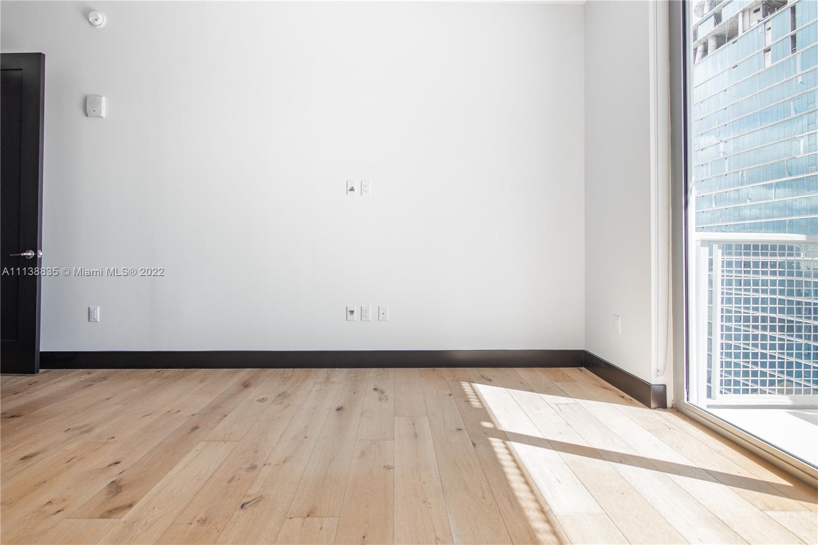 340 Southeast 3rd Street, Unit PH4 Miami, FL 33131 - Photo 14 of 62 a view of an empty room