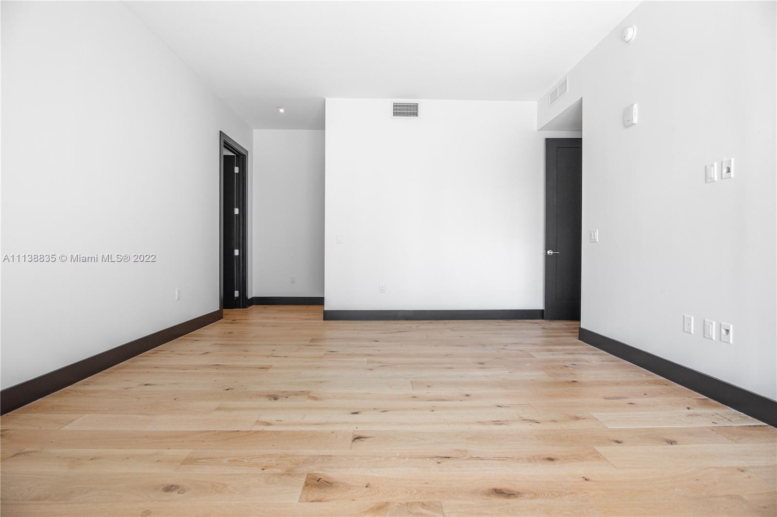 340 Southeast 3rd Street, Unit PH4 Miami, FL 33131 - Photo 25 of 62 a view of an empty room