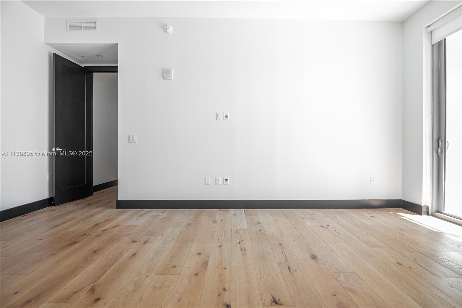 340 Southeast 3rd Street, Unit PH4 Miami, FL 33131 - Photo 26 of 62 a view of an empty room