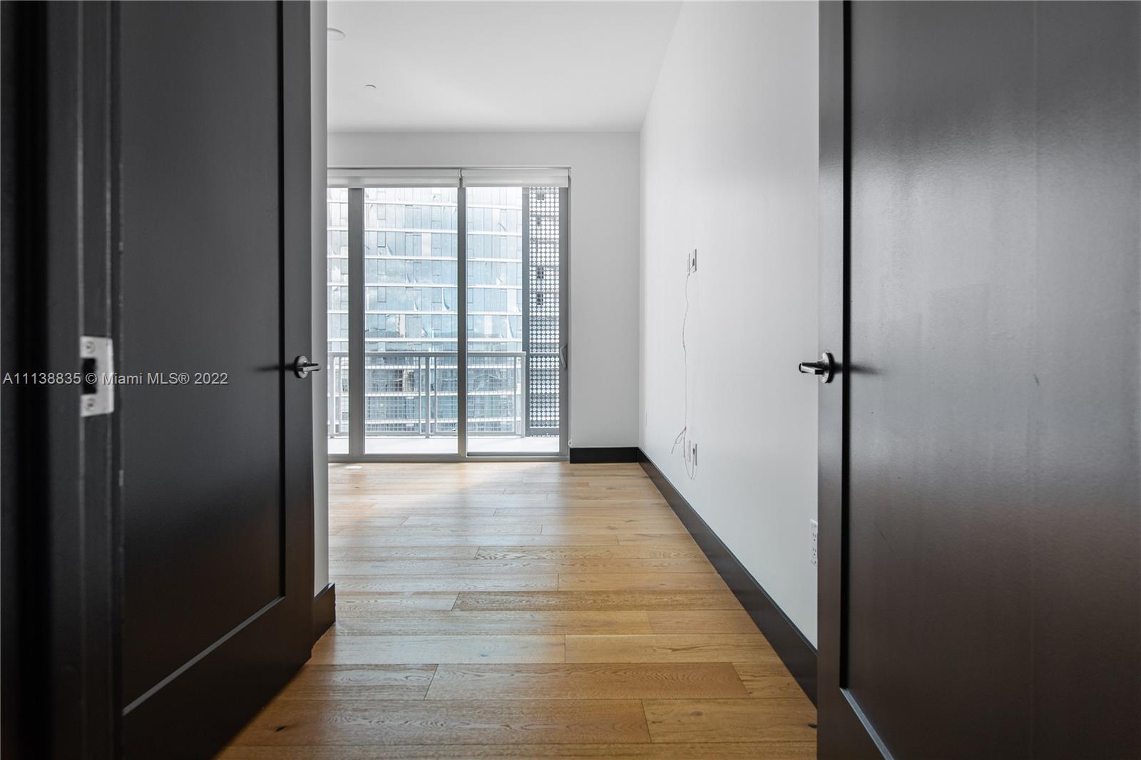 340 Southeast 3rd Street, Unit PH4 Miami, FL 33131 - Photo 38 of 62 a view of a hallway