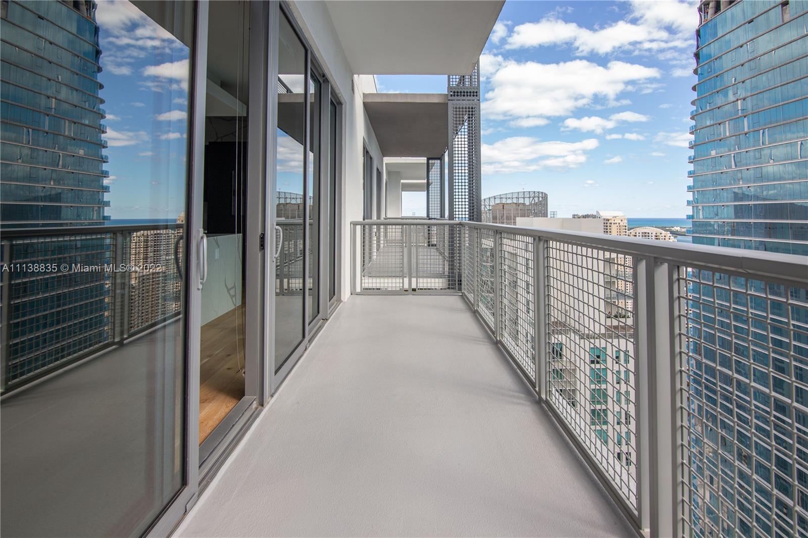 340 Southeast 3rd Street, Unit PH4 Miami, FL 33131 - Photo 60 of 62 a view of balcony with city view