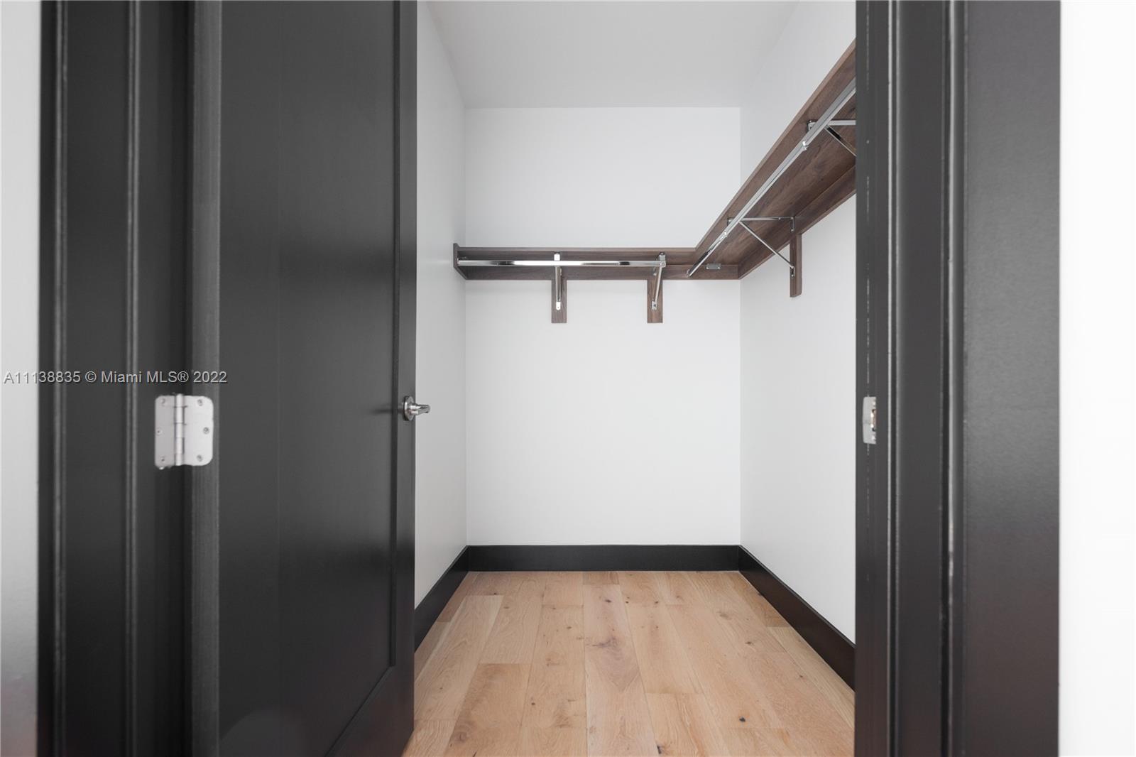 340 Southeast 3rd Street, Unit PH4 Miami, FL 33131 - Photo 10 of 62 a view of walk in closet