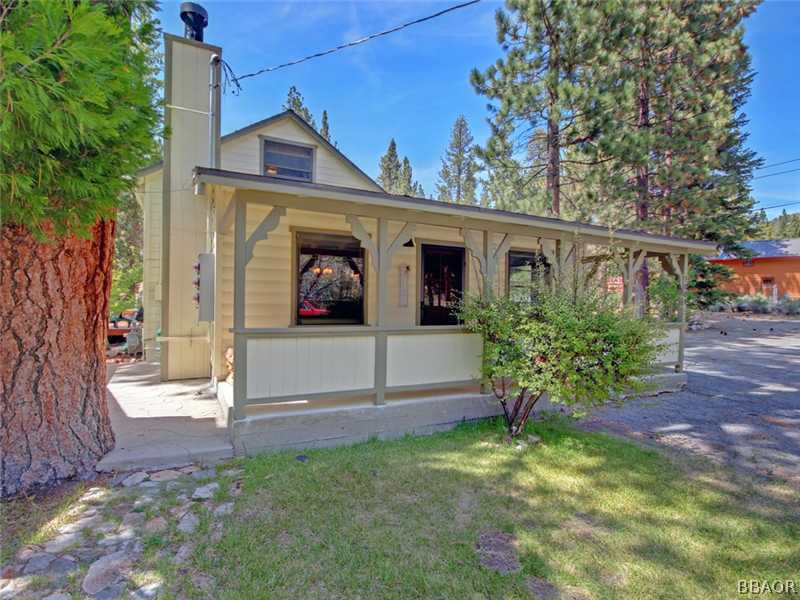 1004 Canyon Road Fawnskin, CA 92333 - Photo 2 of 25 a front view of house with yard