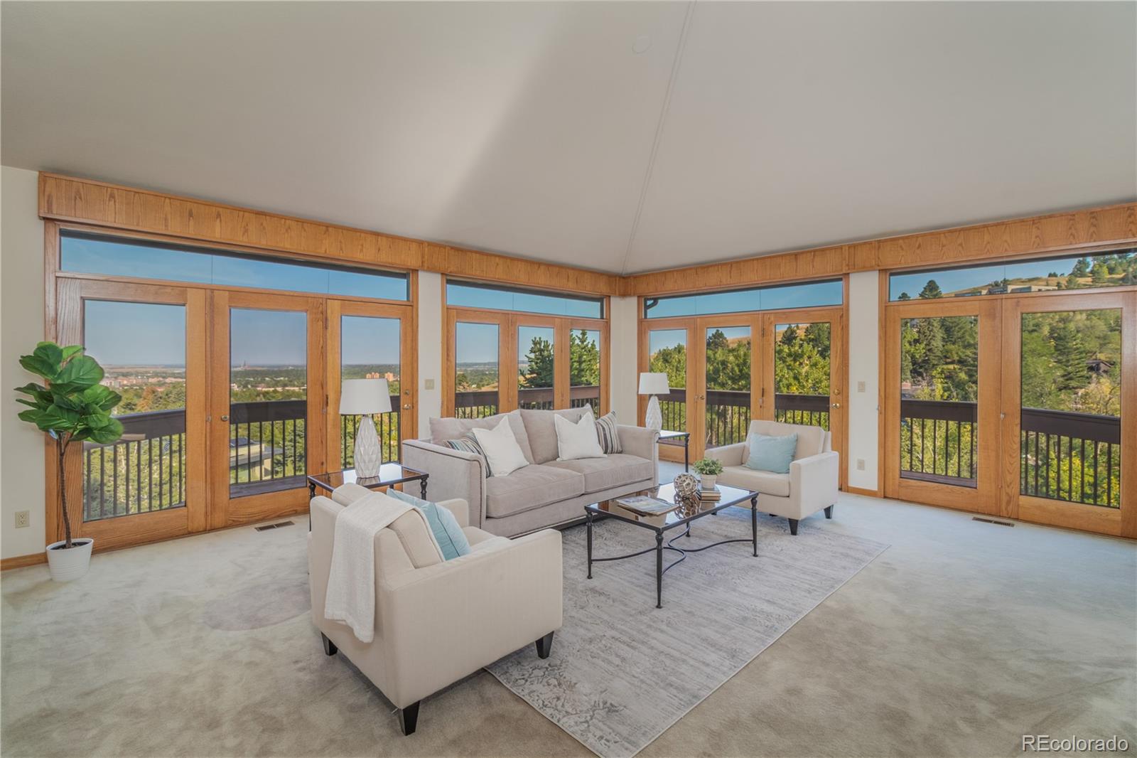 265 Bellevue Drive Boulder, CO 80302 - Photo 11 of 32 a living room with furniture and large windows