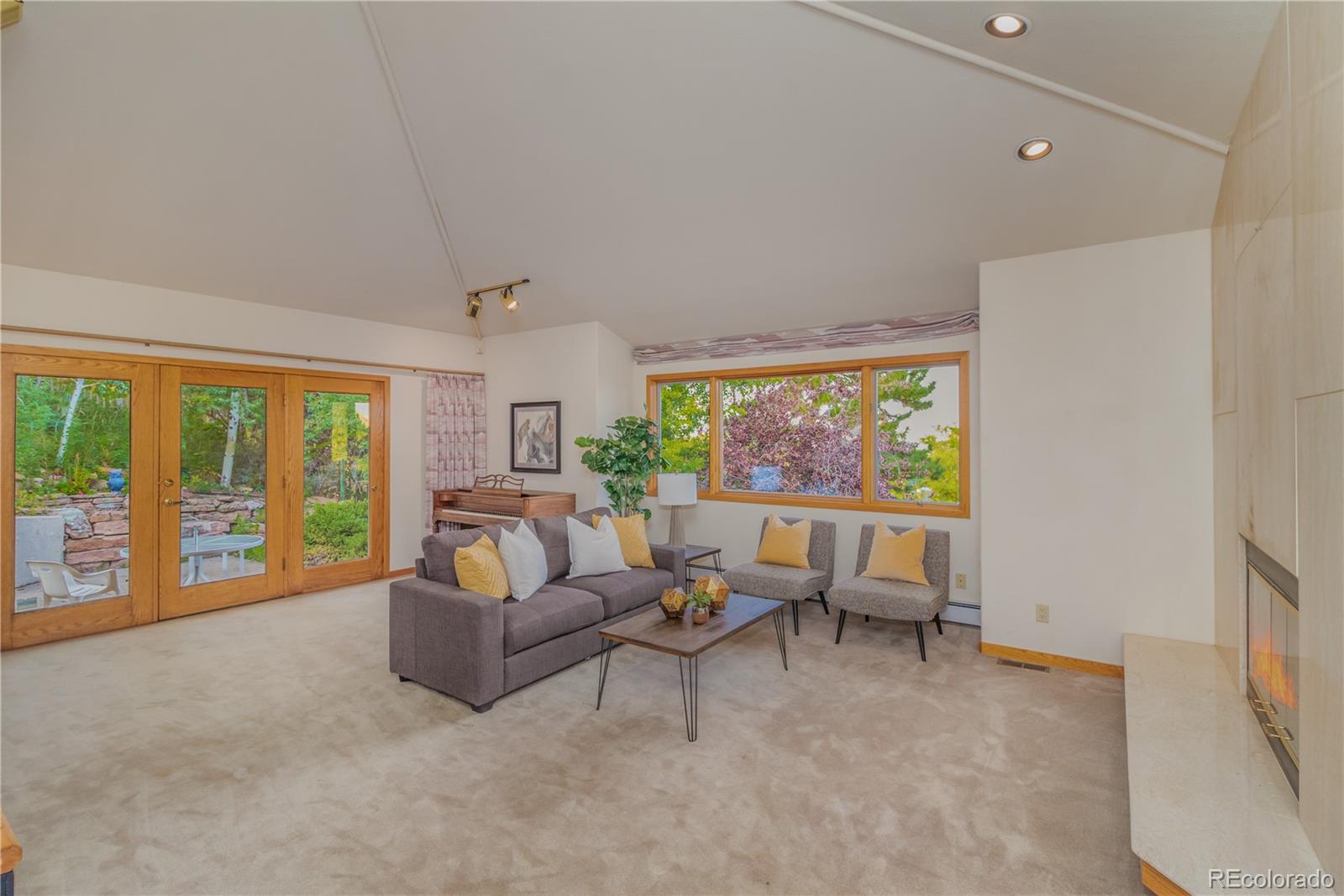265 Bellevue Drive Boulder, CO 80302 - Photo 12 of 32 a living room with furniture and a large window
