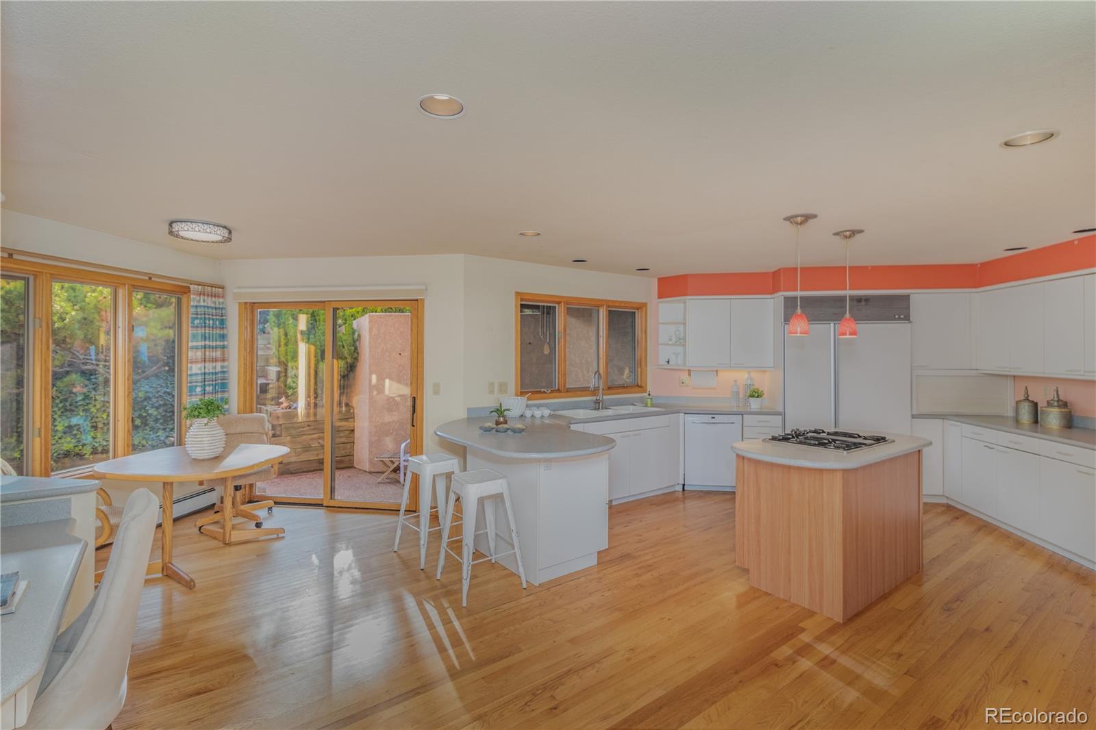 265 Bellevue Drive Boulder, CO 80302 - Photo 15 of 32 a kitchen with a sink and wooden floor