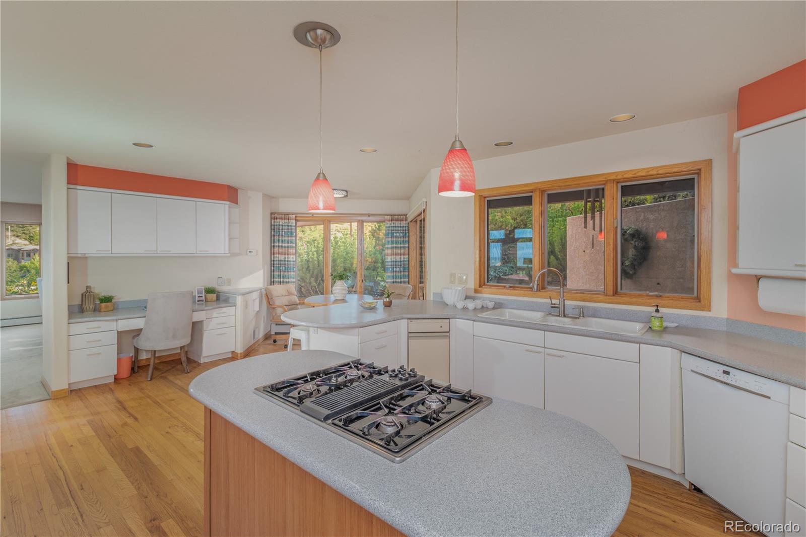 265 Bellevue Drive Boulder, CO 80302 - Photo 17 of 32 a kitchen with stainless steel appliances granite countertop a sink stove and cabinets