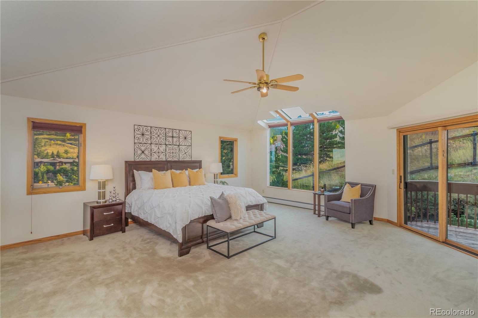 265 Bellevue Drive Boulder, CO 80302 - Photo 19 of 32 a spacious bedroom with a bed and large window