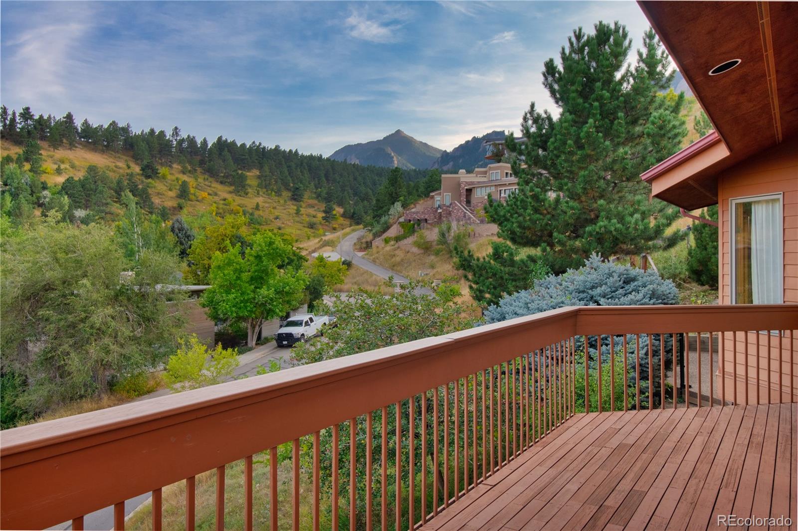 265 Bellevue Drive Boulder, CO 80302 - Photo 2 of 32 a balcony with wooden floor and mountain view