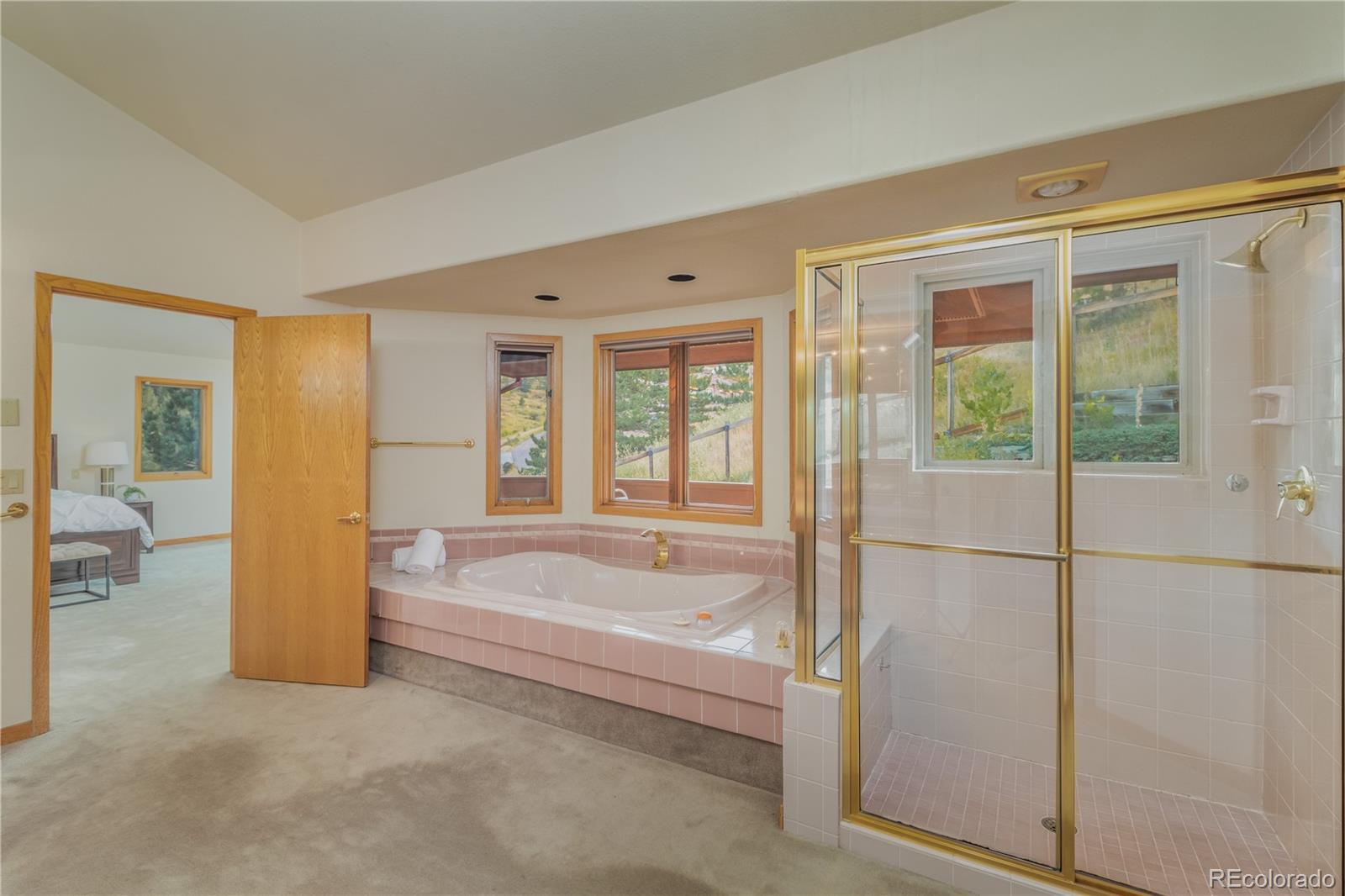 265 Bellevue Drive Boulder, CO 80302 - Photo 21 of 32 a spacious bathroom with a tub and shower