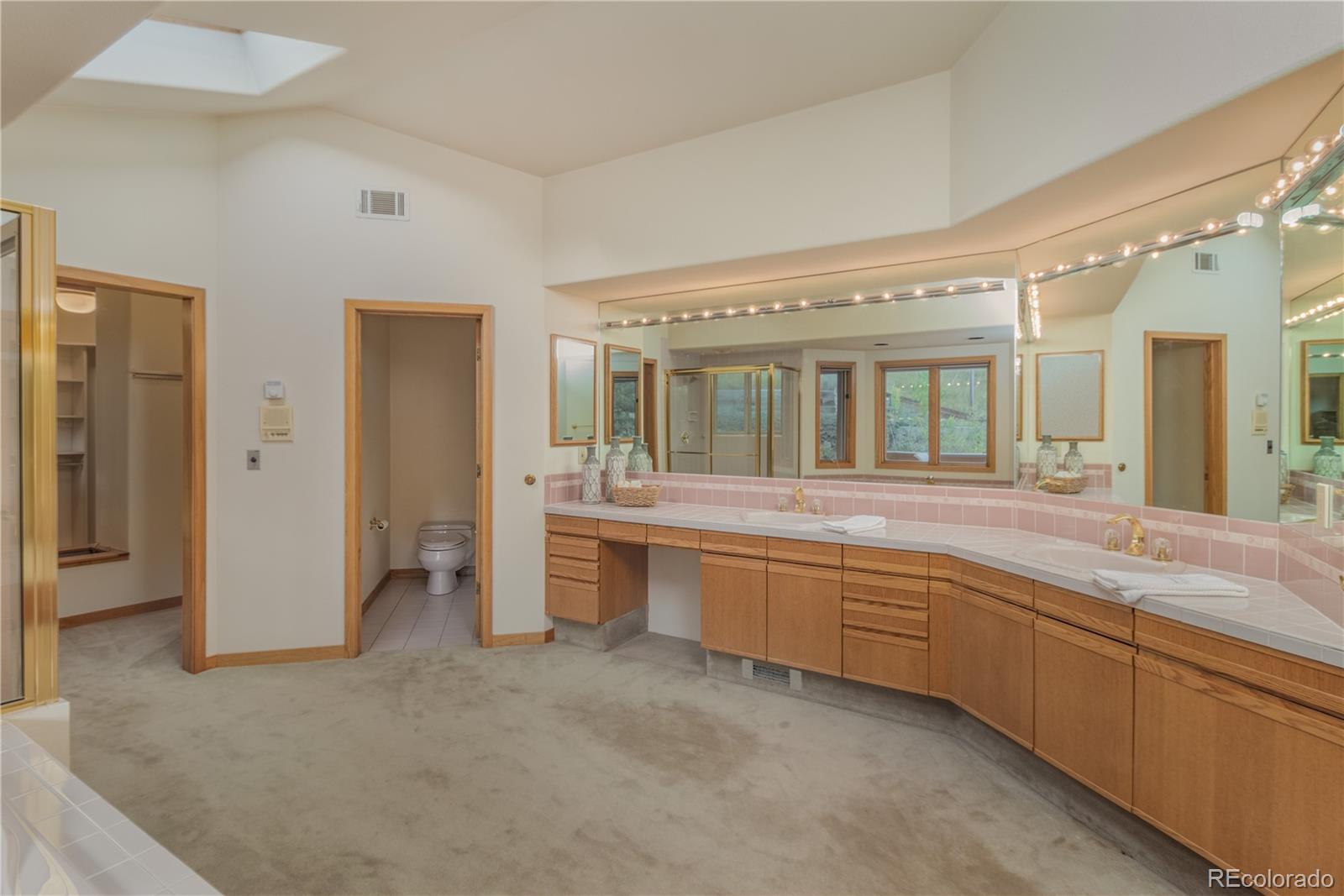 265 Bellevue Drive Boulder, CO 80302 - Photo 22 of 32 a large bathroom with a large tub and sink