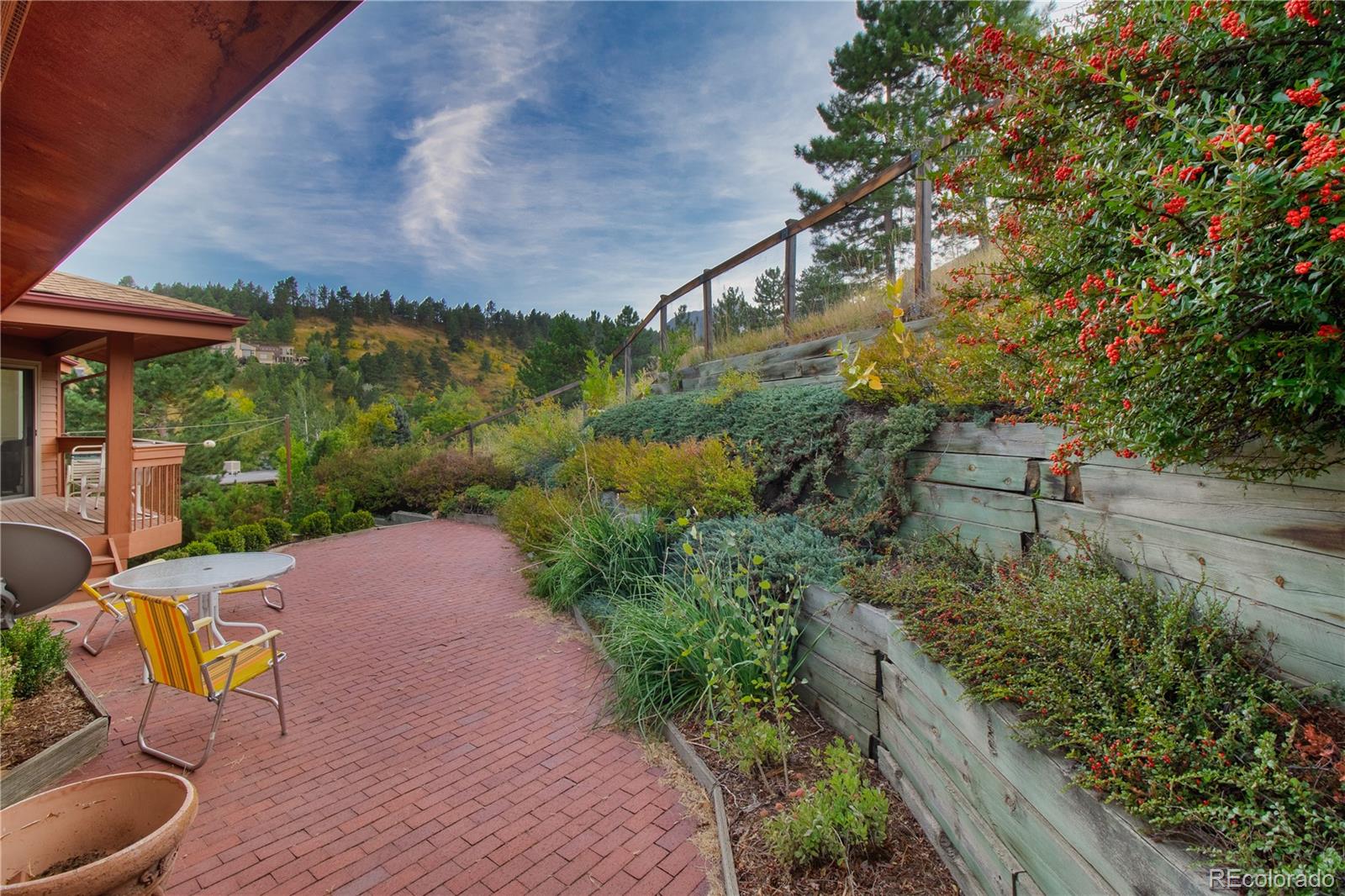 265 Bellevue Drive Boulder, CO 80302 - Photo 31 of 32 a view of a table and chairs under an umbrella