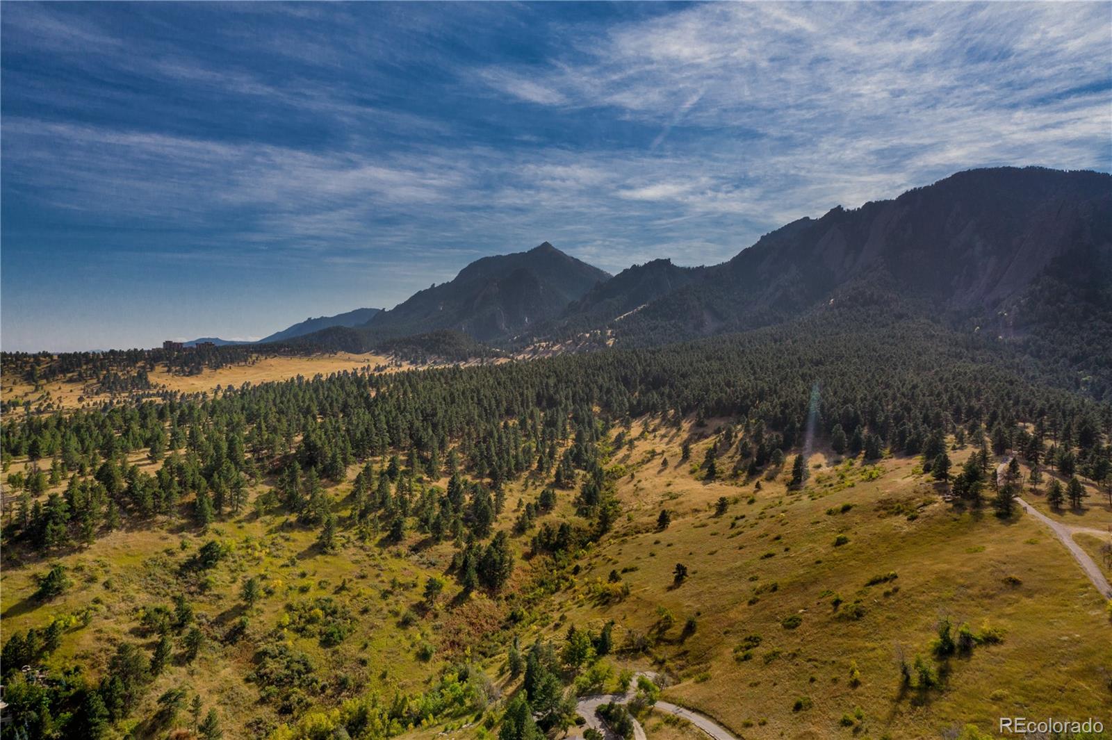 265 Bellevue Drive Boulder, CO 80302 - Photo 5 of 32 a view of a lake with mountains in the background