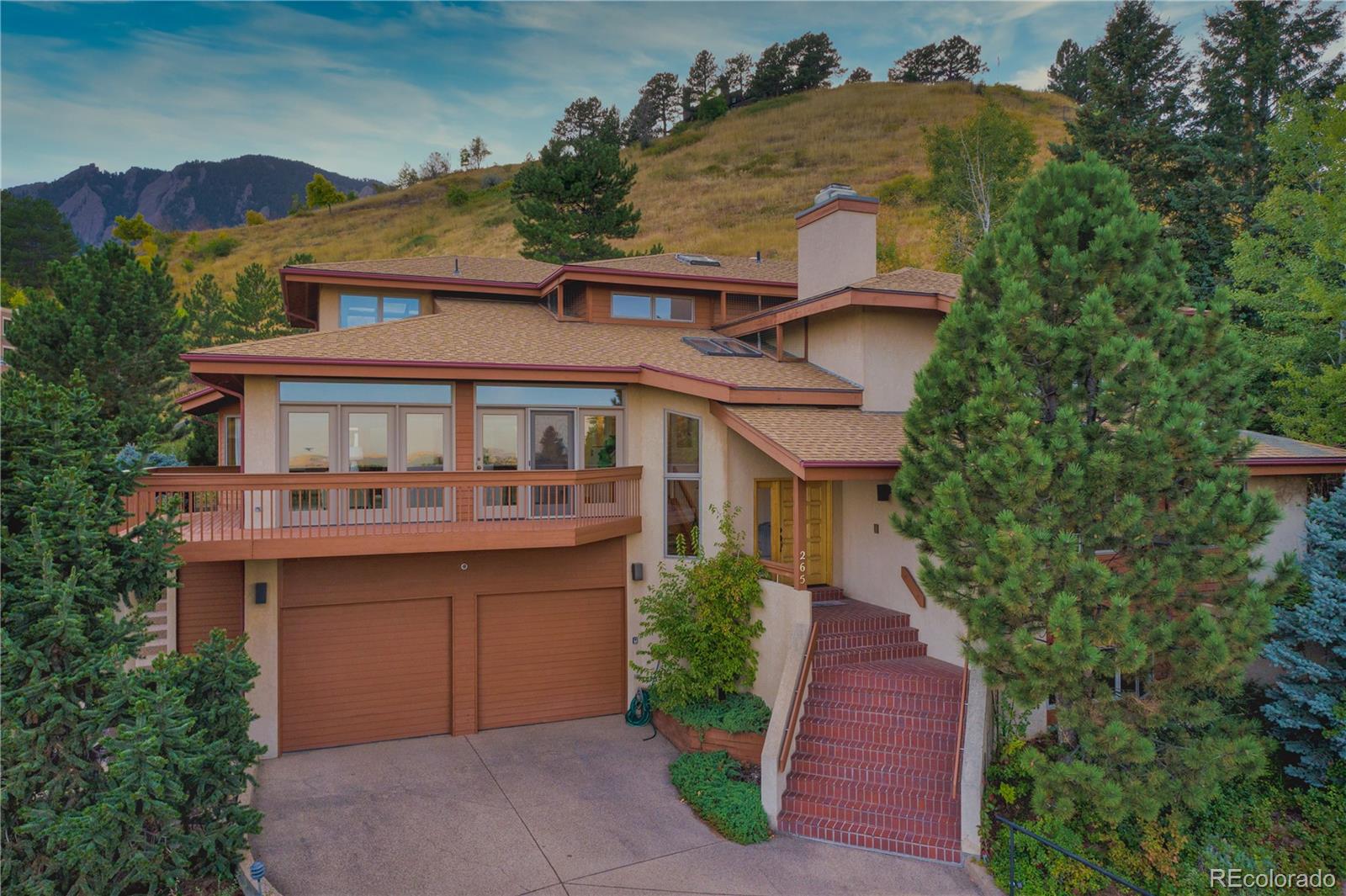 265 Bellevue Drive Boulder, CO 80302 - Photo 7 of 32 a front view of a house with a yard